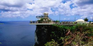 two lovers point with YMCA taxi