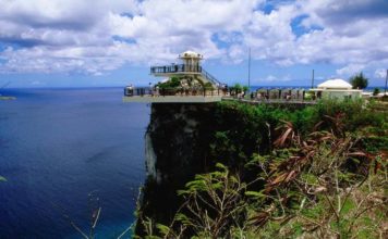 two lovers point with YMCA taxi